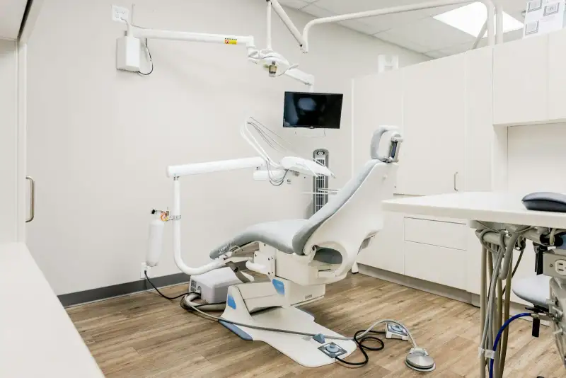Bright, clean dental treatment room with a modern dental chair