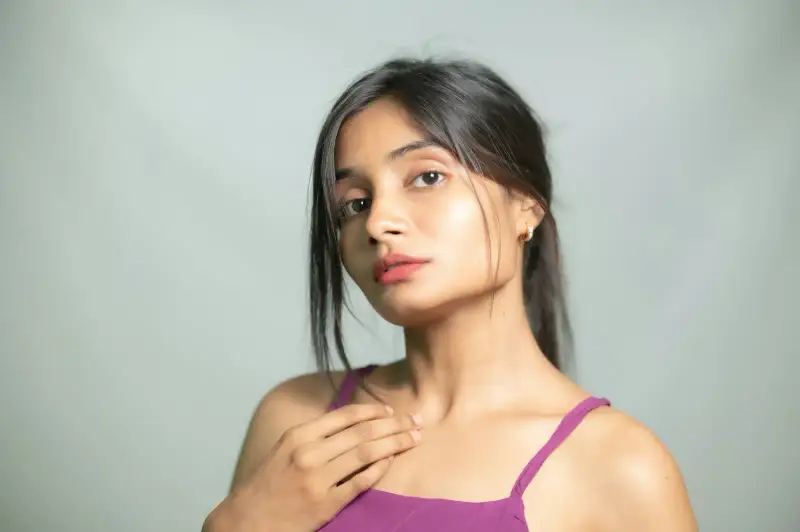 Young woman with clear, healthy skin looking at the camera