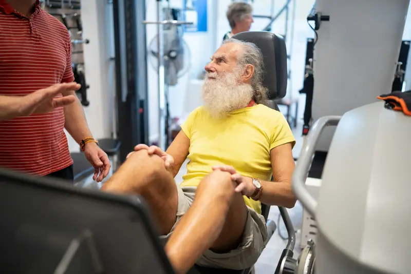 Senior patient doing knee rehabilitation exercises