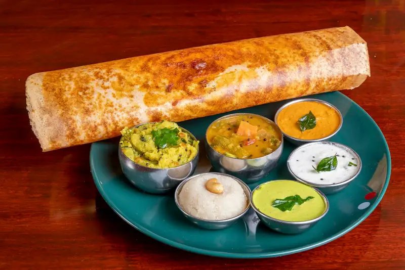 Crispy masala dosa with sambar and three chutneys